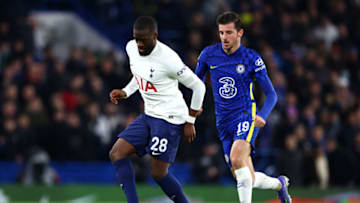 LONDON, ENGLAND - JANUARY 05: Tanguy Ndombele of Tottenham Hotspur passes the ball while under pressure from Mason Mount of Chelsea during the Carabao Cup Semi Final First Leg match between Chelsea and Tottenham Hotspur at Stamford Bridge on January 05, 2022 in London, England. (Photo by Julian Finney/Getty Images)