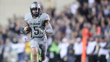 Oct 17, 2015; Boulder, CO, USA; Colorado Buffaloes wide receiver Shay Fields (5) catches a touchdown pass during the first half against the Arizona Wildcats at Folsom Field. Mandatory Credit: Chris Humphreys-USA TODAY Sports