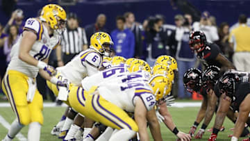 Dec 29, 2015; Houston, TX, USA; LSU Tigers quarterback Brandon Harris (6) prepares to catch a snap against the Texas Tech Red Raiders in the second half at NRG Stadium. LSU won 56 to 27. Mandatory Credit: Thomas B. Shea-USA TODAY Sports