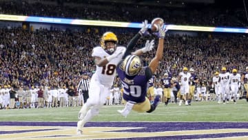SEATTLE, WA - SEPTEMBER 22: Ty Jones #20 of the Washington Huskies completes a 19 yard touchdown against Langston Frederick #18 of the Arizona State Sun Devils in the first quarter during their game at Husky Stadium on September 22, 2018 in Seattle, Washington. (Photo by Abbie Parr/Getty Images)