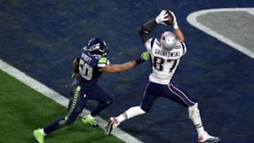 Feb 1, 2015; Glendale, AZ, USA; New England Patriots tight end Rob Gronkowski (87) catches a touchdown pass over Seattle Seahawks outside linebacker K.J. Wright (50) during the second quarter in Super Bowl XLIX at University of Phoenix Stadium. Mandatory Credit: Richard Mackson-USA TODAY Sports