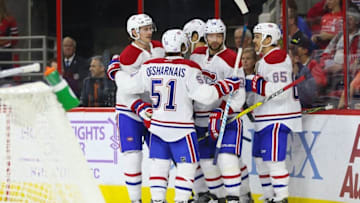 Nov 18, 2016; Raleigh, NC, USA; Montreal Canadiens forward Andrew Shaw (65) celebrates with teammates after scoring a goal in the third period against the Carolina Hurricanes at PNC Arena. The Hurricanes won 3-2. Mandatory Credit: James Guillory-USA TODAY Sports
