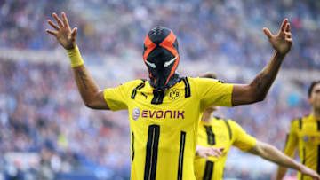 GELSENKIRCHEN, GERMANY - APRIL 01: Pierre Emerick Aubameyang ( Borussia Dortmund ) celebrates as he scores the goal with a mask during the Bundesliga match between FC Schalke 04 and Borussia Dortmund at Veltins-Arena on April 1, 2017 in Gelsenkirchen, Germany. (Photo by Stefan Matzke - sampics/Corbis via Getty Images)