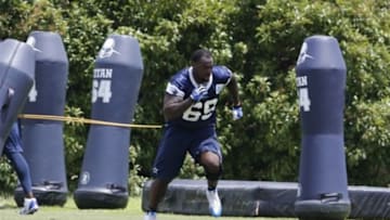 Jun 17, 2014; Dallas, TX, USA; Dallas Cowboys defensive tackle Henry Melton (69) works out during minicamp at Cowboys headquarters at Valley Ranch. Mandatory Credit: Matthew Emmons-USA TODAY Sports