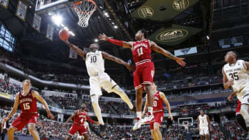 INDIANAPOLIS, IN - DECEMBER 16: TJ Gibbs #10 of the Notre Dame Fighting Irish drives to the basket against Devonte Green #11 of the Indiana Hoosiers in the first half of the Crossroads Classic at Bankers Life Fieldhouse on December 16, 2017 in Indianapolis, Indiana. (Photo by Joe Robbins/Getty Images)