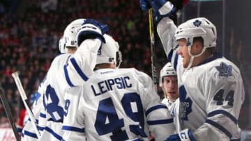 Feb 27, 2016; Montreal, Quebec, CAN; Toronto Maple Leafs defenseman Matt Hunwick (2) celebrates his goal against Montreal Canadiens with teammates during the first period at Bell Centre. Mandatory Credit: Jean-Yves Ahern-USA TODAY Sports