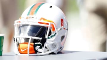 Sep 28, 2013; Tampa, FL, USA; Miami Hurricanes helmet on the sidelines against the South Florida Bulls during the second half at Raymond James Stadium. Miami Hurricanes defeated the South Florida Bulls 49-21. Mandatory Credit: Kim Klement-USA TODAY Sports