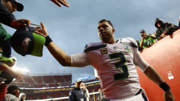 SANTA CLARA, CA - DECEMBER 16: Russell Wilson #3 of the Seattle Seahawks greets fans following their 26-23 loss to the San Francisco 49ers at Levi's Stadium on December 16, 2018 in Santa Clara, California. (Photo by Ezra Shaw/Getty Images)