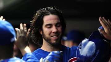 Sep 7, 2015; St. Louis, MO, USA; Chicago Cubs starting pitcher Dan Haren (50) is congratulated by teammates after driving in a run on a sacrifice fly off of St. Louis Cardinals relief pitcher Tyler Lyons (not pictured) during the fifth inning at Busch Stadium. Mandatory Credit: Jeff Curry-USA TODAY Sports