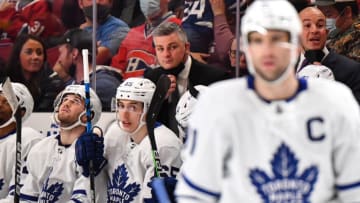 Head coach of the Toronto Maple Leafs, Sheldon Keefe, handles bench duties during the third period against the Montreal Canadiens at Centre Bell on March 26, 2022 in Montreal, Canada. The Montreal Canadiens defeated the Toronto Maple Leafs 4-2. (Photo by Minas Panagiotakis/Getty Images)