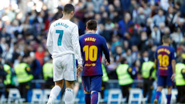 Cristiano Ronaldo of Real Madrid and Lionel Messi of Barcelona (Photo by TF-Images/TF-Images via Getty Images)