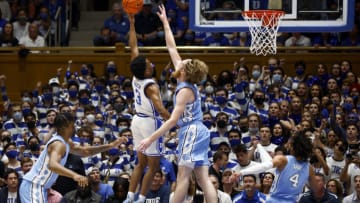 DURHAM, NORTH CAROLINA - MARCH 05: Jeremy Roach #3 of the Duke Blue Devils attempts a shot against Brady Manek #45 of the North Carolina Tar Heels during the first half of the game at Cameron Indoor Stadium on March 05, 2022 in Durham, North Carolina. (Photo by Jared C. Tilton/Getty Images)