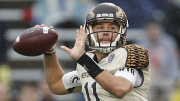Nov 27, 2015; Toledo, OH, USA; Western Michigan Broncos quarterback Zach Terrell (11) throws a pass during the third quarter against the Toledo Rockets at Glass Bowl. Broncos win 35-30. Mandatory Credit: Raj Mehta-USA TODAY Sports