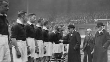 April 1934: King George V (1865 - 1936) shakes hands with members of Manchester City football team before the 1934 FA Cup Final at Wembley. Manchester City went on to win the match with a 2-1 victory over Portsmouth. (Photo by Fox Photos/Getty Images)