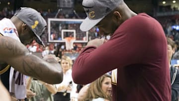 May 27, 2016; Toronto, Ontario, CAN; Cleveland Cavaliers forward LeBron James (23) celebrates the win with Cleveland Cavaliers forward Channing Frye (9) at the end of game six of the Eastern conference finals of the NBA Playoffs against theToronto Raptors at Air Canada Centre. The Cleveland Cavaliers won 113-87. Mandatory Credit: Nick Turchiaro-USA TODAY Sports