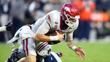 Auburn footballOct 10, 2020; Auburn, Alabama, USA; Auburn Tigers linebacker Zakoby McClain (9) trips up Arkansas Razorbacks quarterback Feleipe Franks (13) during the fourth quarter at Jordan-Hare Stadium. Mandatory Credit: John David Mercer-USA TODAY Sports