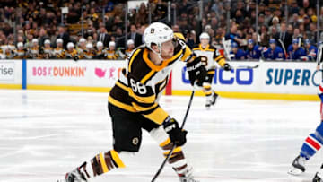 BOSTON, MA - MARCH 27: Boston Bruins right wing David Pastrnak (88) shoots during a game between the Boston Bruins and the New York Rangers on March 27, 2019, at TD Garden in Boston, Massachusetts. (Photo by Fred Kfoury III/Icon Sportswire via Getty Images)