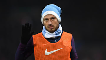 LIVERPOOL, ENGLAND - JANUARY 14: David Silva of Manchester City warms up during the Premier League match between Liverpool and Manchester City at Anfield on January 14, 2018 in Liverpool, England. (Photo by Shaun Botterill/Getty Images)