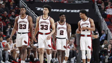 LOUISVILLE, KY - JANUARY 25: Steven Enoch #23, Jordan Nwora #33, Darius Perry #2 and Dwayne Sutton #24 of the Louisville Cardinals take the floor in the second half of a game against the Clemson Tigers at KFC YUM! Center on January 25, 2020 in Louisville, Kentucky. Louisville defeated Clemson 80-62. (Photo by Joe Robbins/Getty Images)