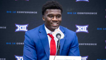 Jul 13, 2022; Arlington, TX, USA; Kansas Jayhawks safety Kenny Logan Jr is interviewed during the Big 12 Media Day at AT&T Stadium. Mandatory Credit: Jerome Miron-USA TODAY Sports
