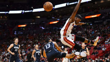 Miami Heat forward Jimmy Butler (22) misses a high pass as Orlando Magic guard R.J. Hampton (13) defends(Jim Rassol-USA TODAY Sports)