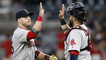 ATLANTA, GA - SEPTEMBER 04: First baseman Steve Pearce #25 of the Boston Red Sox high fives teammate and catcher Sandy Leon #3 after the game against the Atlanta Braves at SunTrust Park on September 4, 2018 in Atlanta, Georgia. (Photo by Mike Zarrilli/Getty Images)