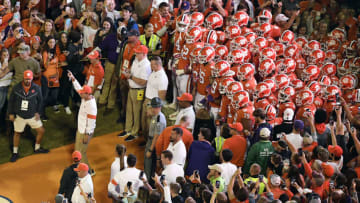 CLEMSON, SOUTH CAROLINA - OCTOBER 26: Head coach Dabo Swinney of the Clemson Tigers points to the sky as the Tigers prepare to run down the hill prior to their homecoming game against the Boston College Eagles at Memorial Stadium on October 26, 2019 in Clemson, South Carolina. (Photo by Mike Comer/Getty Images)