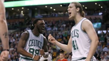 Jan 27, 2016; Boston, MA, USA; Boston Celtics forward Jae Crowder (99) and center Kelly Olynyk (41) react after a basket by Olynyk and being fouled by the Denver Nuggets in the second half at TD Garden. The Celtics defeated Denver 111-103. Mandatory Credit: David Butler II-USA TODAY Sports