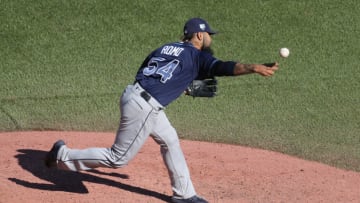 TORONTO, ON - SEPTEMBER 23: Sergio Romo #54 of the Tampa Bay Rays delivers a pitch in the ninth inning during MLB game action against the Toronto Blue Jays at Rogers Centre on September 23, 2018 in Toronto, Canada. (Photo by Tom Szczerbowski/Getty Images)