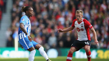 BRIGHTON, ENGLAND - OCTOBER 29: Gaetan Bong of Brighton and Hove Albion is watched by James Ward-Prowse of Southampton during the Premier League match between Brighton and Hove Albion and Southampton at Amex Stadium on October 29, 2017 in Brighton, England. (Photo by Steve Bardens/Getty Images)