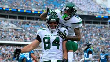 JACKSONVILLE, FLORIDA - OCTOBER 27: Ryan Griffin #84 and Robby Anderson #11 of the New York Jets celebrate a touchdown during the game against the Jacksonville Jaguars at TIAA Bank Field on October 27, 2019 in Jacksonville, Florida. (Photo by Sam Greenwood/Getty Images)