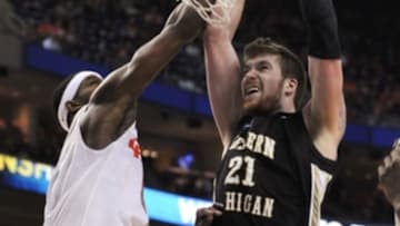 Mar 20, 2014; Buffalo, NY, USA; Western Michigan Broncos center Shayne Whittington (21) dunks against Syracuse Orange in the second half of a men