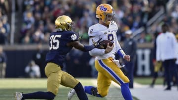 SOUTH BEND, IN - OCTOBER 13: Kenny Pickett #8 of the Pittsburgh Panthers scambles for the first down against TaRiq Bracy #35 of the Notre Dame Fighting Irish in the second half at Notre Dame Stadium on October 13, 2018 in South Bend, Indiana. (Photo by Quinn Harris/Getty Images)