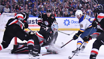Nov 23, 2022; Buffalo, New York, USA; Buffalo Sabres goaltender Ukko-Pekka Luukkonen (1) blocks a shot by St. Louis Blues center Nikita Alexandrov (59) in the third period at KeyBank Center. Mandatory Credit: Mark Konezny-USA TODAY Sports