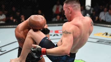 NEWARK, NJ - AUGUST 03: (R-L) Colby Covington knees Robbie Lawler in their welterweight bout during the UFC Fight Night event at the Prudential Center on August 3, 2019 in Newark, New Jersey. (Photo by Josh Hedges/Zuffa LLC/Zuffa LLC via Getty Images)