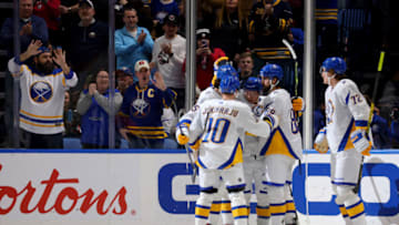 Feb 1, 2023; Buffalo, New York, USA; Buffalo Sabres right wing Alex Tuch (89) celebrates his goal with teammates during the first period against the Carolina Hurricanes at KeyBank Center. Mandatory Credit: Timothy T. Ludwig-USA TODAY Sports