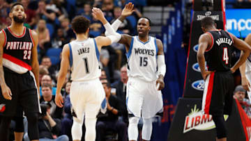 MINNEAPOLIS, MN - APRIL 03: Tyus Jones #1 and Shabazz Muhammad #15 of the Minnesota Timberwolves high five during the game against the Portland Trail Blazers at the Target Center in Minneapolis, Minnesota on April 3, 2017. NOTE TO USER: User expressly acknowledges and agrees that, by downloading and/or using this photograph, user is consenting to the terms and conditions of the Getty Images License Agreement. Mandatory Copyright Notice: Copyright 2017 NBAE (Photo by Jordan Johnson/NBAE via Getty Images)