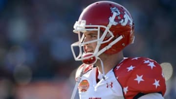 Jan 25, 2014; Mobile, AL, USA; South squad quarterback Derek Carr of Fresno State (4) walks off the field against the North squad during the first quarter at Ladd-Peebles Stadium. Mandatory Credit: John David Mercer-USA TODAY Sports