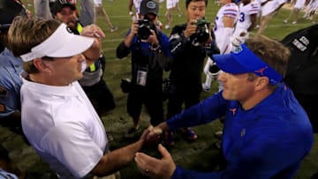 JACKSONVILLE, FL - OCTOBER 27: Head coach Kirby Smart of the Georgia Bulldogs and head coach Dan Mullen of the Florida Gators shake hands following a game at TIAA Bank Field on October 27, 2018 in Jacksonville, Florida. (Photo by Mike Ehrmann/Getty Images)