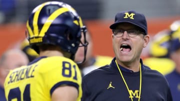 ARLINGTON, TX - SEPTEMBER 02: Head coach Jim Harbaugh of the Michigan Wolverines looks on during warmups before the college football game against the Florida Gators at AT&T Stadium on September 2, 2017 in Arlington, Texas. (Photo by Ronald Martinez/Getty Images)