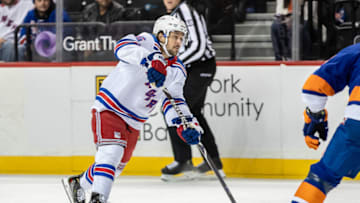BROOKLYN, NY - NOVEMBER 15: Mats Zuccarello (36), of the New York Rangers, shoots the puck during a game between the New York Islanders and the New York Rangers on November 15, 2018 at the Barclays Center in Brooklyn, NY. (Photo by John McCreary/Icon Sportswire via Getty Images)
