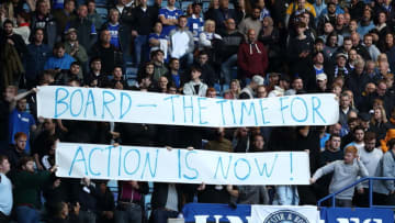 Leicester City fans hold up a banner which says 'Board the time for action is now' during the Premier League match between Leicester City and Crystal Palace (Photo by James Williamson - AMA/Getty Images)