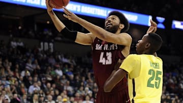 March 20, 2016; Spokane , WA, USA; St. Joseph's Hawks forward DeAndre Bembry (43) moves to the basket against Oregon Ducks forward Chris Boucher (25) during the second half in the second round of the 2016 NCAA Tournament at Spokane Veterans Memorial Arena. Mandatory Credit: James Snook-USA TODAY Sports