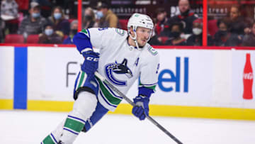 OTTAWA, ONTARIO - DECEMBER 01: J.T. Miller #9 of the Vancouver Canucks skates with the puck against the Ottawa Senators at Canadian Tire Centre on December 01, 2021 in Ottawa, Ontario. (Photo by Chris Tanouye/Getty Images)
