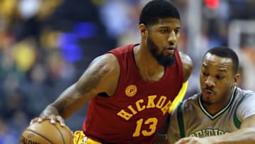 Dec 22, 2016; Indianapolis, IN, USA; Indiana Pacers forward Paul George (13) drives to the basket against Boston Celtics guard Avery Bradley (0) at Bankers Life Fieldhouse. Mandatory Credit: Brian Spurlock-USA TODAY Sports