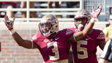 TALLAHASSEE, FL - DECEMBER 02: Florida State Seminoles running back Cam Akers (3) celebrates with Florida State Seminoles wide receiver Ermon Lane III (5) during the game between the Florida State Seminoles and the Louisiana-Monroe Warhawks on December 02, 2017 at Doak Campbell Stadium in Tallahassee, Florida.. (Photo by Logan Stanford/Icon Sportswire via Getty Images)