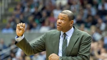 Feb 25, 2013; Salt Lake City, UT, USA; Boston Celtics head coach Doc Rivers calls a play during the second half against the Utah Jazz at EnergySolutions Arena. The Celtics won in overtime 110-107. Mandatory Credit: Russ Isabella-USA TODAY Sports