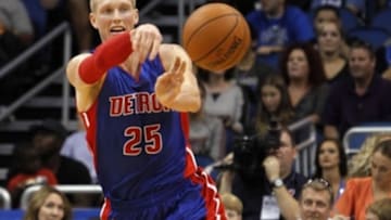 Oct 17, 2014; Orlando, FL, USA; Detroit Pistons forward Kyle Singler (25) passes the ball against the Orlando Magic during the first half at Amway Center. Mandatory Credit: Kim Klement-USA TODAY Sports