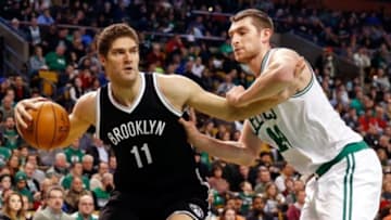 Dec 26, 2014; Boston, MA, USA; Brooklyn Nets center Brook Lopez (11) looks to get around Boston Celtics center Tyler Zeller (44) during the first quarter at TD Garden. Mandatory Credit: Winslow Townson-USA TODAY Sports