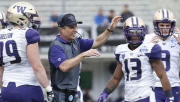 Dec 26, 2015; Dallas, TX, USA; Washington Huskies head coach Chris Peterson reacts after a play in the game against the Southern Miss Golden Eagles at Cotton Bowl Stadium. Mandatory Credit: Tim Heitman-USA TODAY Sports